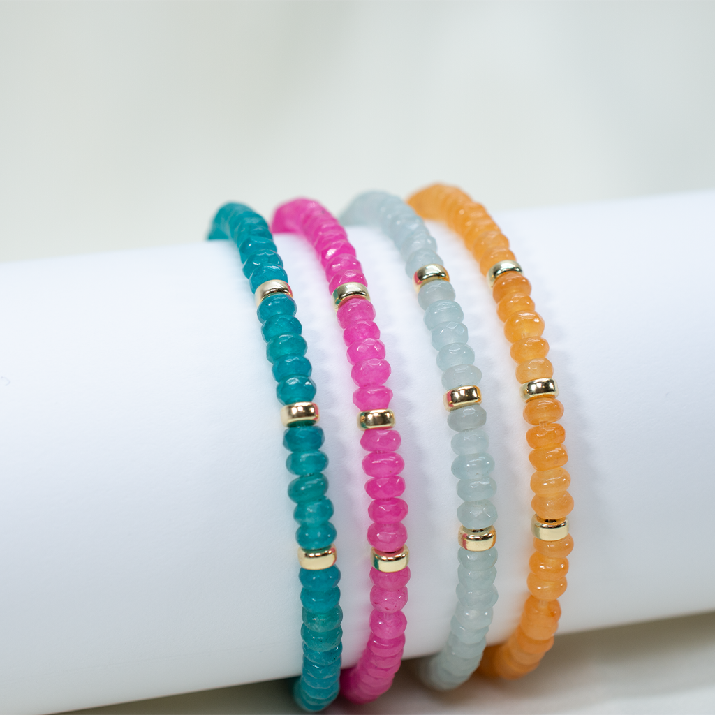 Summertime bracelet shown in Azul, Hot Pink, Skye and Orange.